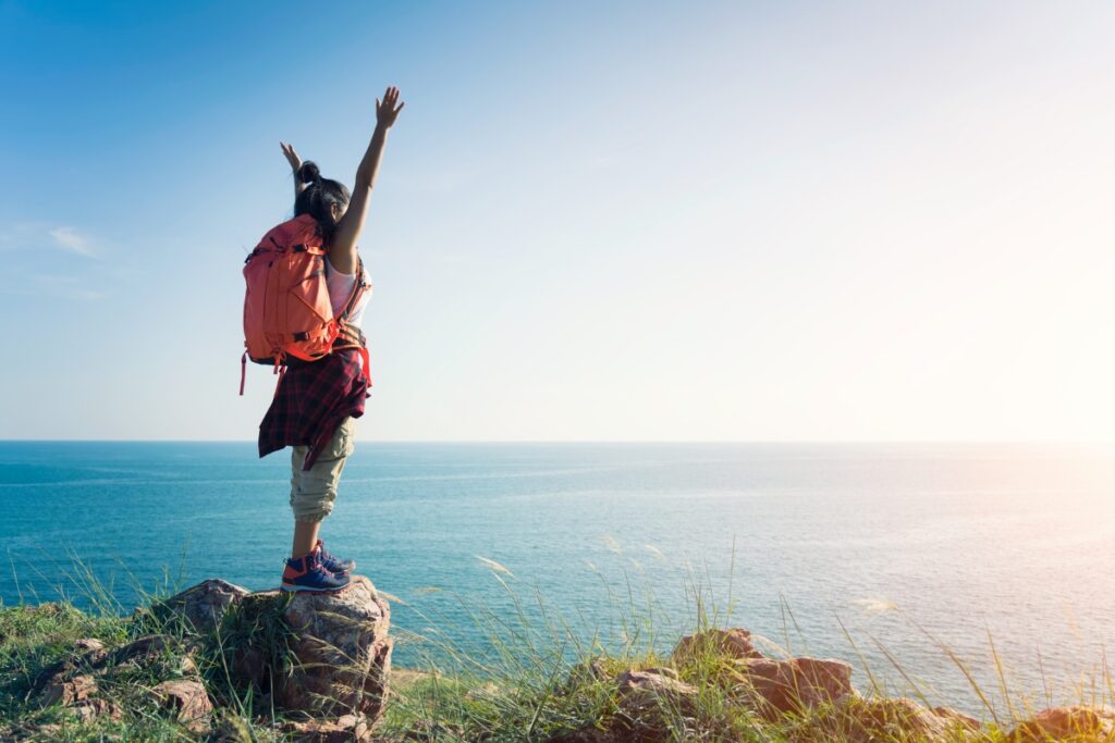 An adventurous woman with a backpack. 